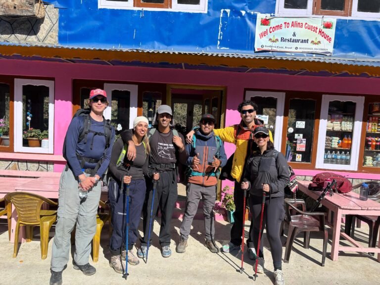 Trekkers posing in front of a tea house in Banthathi on the Ghorepani Poonhill Trek.